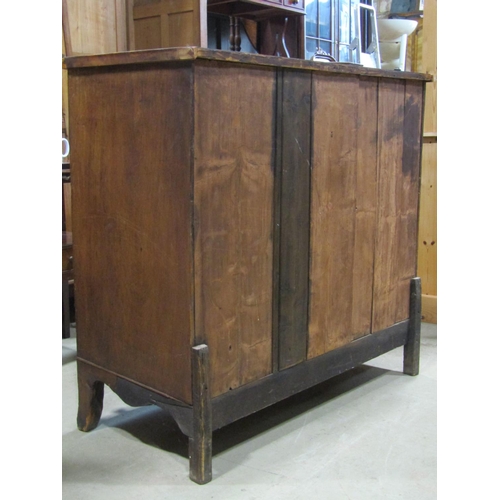 1294 - A 19th century mahogany bedroom chest of two short over three long graduated drawers, with shaped ap... 