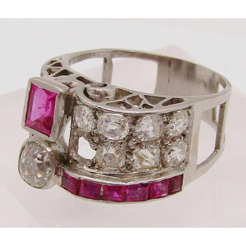 305 - Impressive vari-cut diamond and ruby cocktail ring with raised scrolled setting, largest diamond 0.4... 