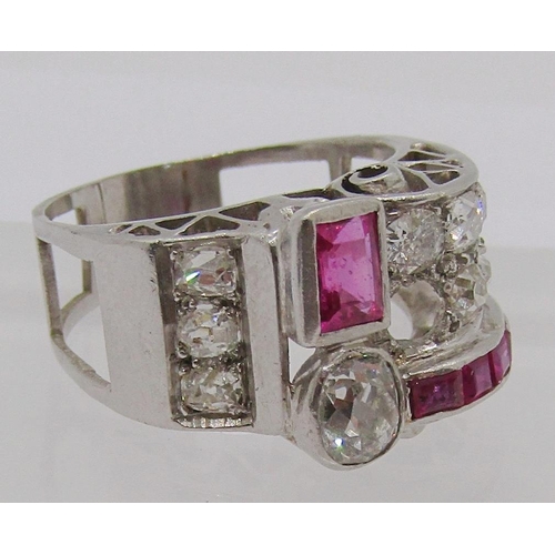 305 - Impressive vari-cut diamond and ruby cocktail ring with raised scrolled setting, largest diamond 0.4... 