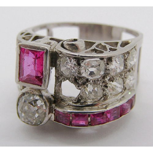 305 - Impressive vari-cut diamond and ruby cocktail ring with raised scrolled setting, largest diamond 0.4... 