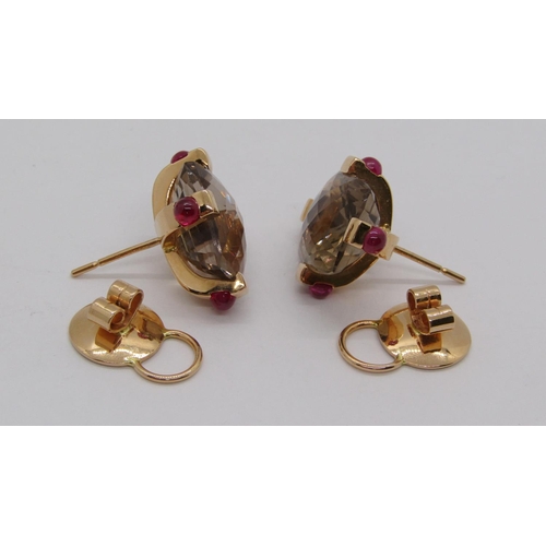 321 - Pair of 18ct stud earrings set with faceted hessonite and cabochon rubies, 20.5g