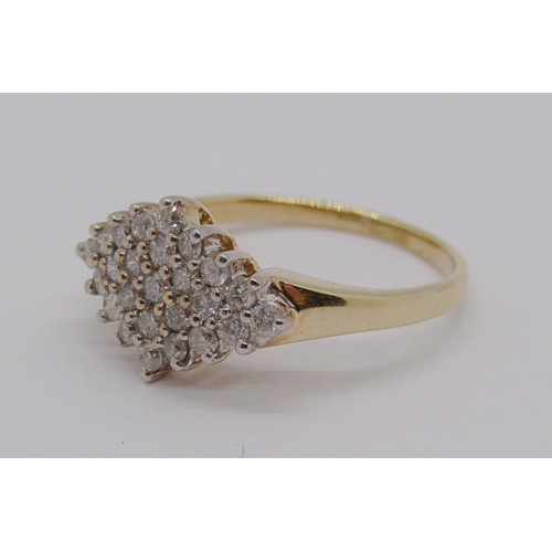 325 - 14ct diamond cluster ring, stamped 'Cardow', size K/L, 2.8g