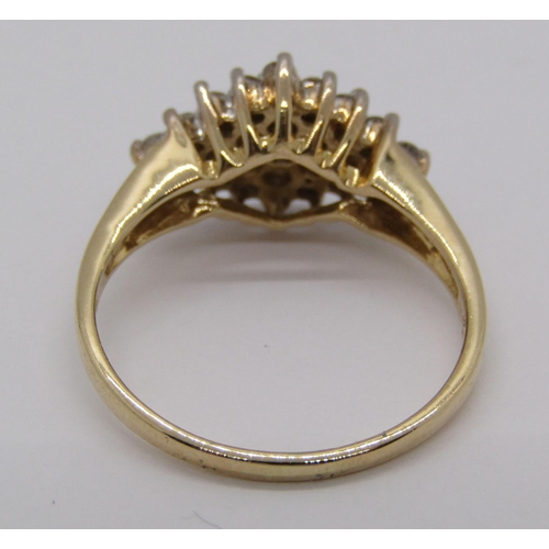 325 - 14ct diamond cluster ring, stamped 'Cardow', size K/L, 2.8g