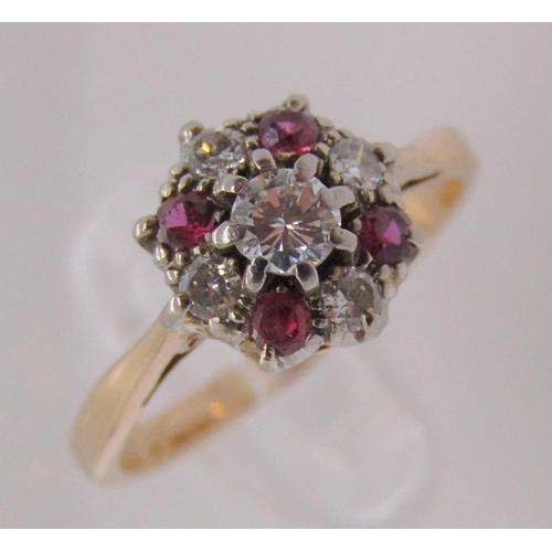 331 - 18ct ruby and diamond cluster ring, centre stone 0.15ct approx, size L/M, 3g