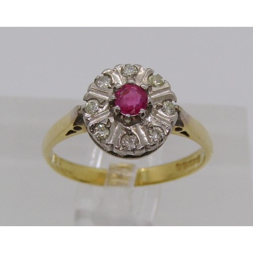 333 - 18ct ruby and diamond cluster ring, size N, 3.3g