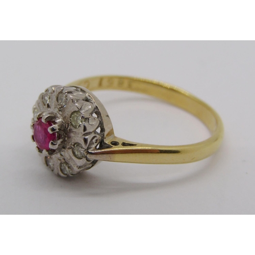 333 - 18ct ruby and diamond cluster ring, size N, 3.3g