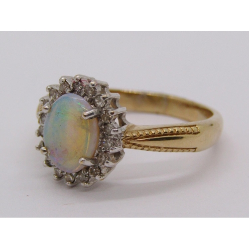 335 - 9ct opal and diamond oval cluster ring, size Q, 4.1g