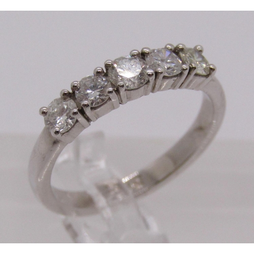 337 - 18ct white gold five stone diamond ring, each stone 0.15ct approx, size N, 4.1g