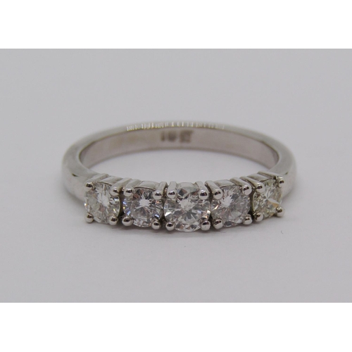 337 - 18ct white gold five stone diamond ring, each stone 0.15ct approx, size N, 4.1g