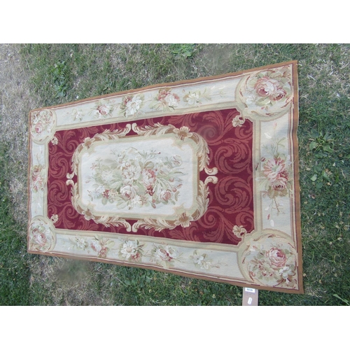 1817 - A small 18th century style tapestry wall panel,  with flowers to the centre and scrolled decoration,... 