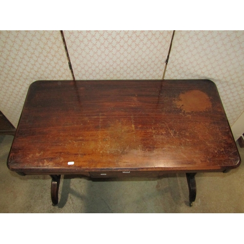 1268 - A Victorian mahogany side/centre table of rectangular form with moulded outline and rounded corners ... 