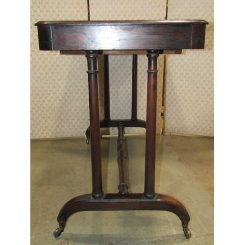 1268 - A Victorian mahogany side/centre table of rectangular form with moulded outline and rounded corners ... 