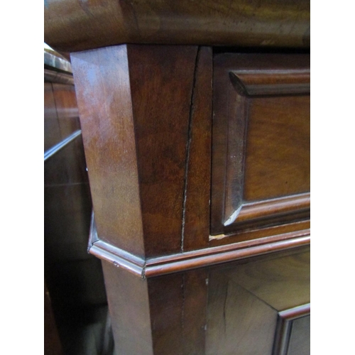 1310 - A pair of substantial 19th century mahogany buffets/side cupboards, each enclosed by a pair of  well... 