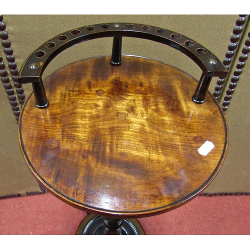 1517 - A Victorian mahogany and ebonised circular occasional table, the disk base supporting a turned colum... 