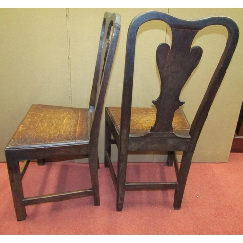 1605 - A pair of Georgian country made side chairs in oak with vase shaped splats, solid seats and square c... 