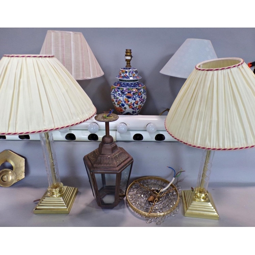 694 - A collection of table lamps, two brass and glass column, a pair of wooden turned, a floral ginger ja... 