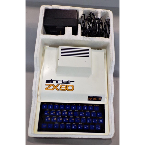 701 - An original Sinclair ZX80 computer system with plugs and lead, in its original polystyrene box and c... 