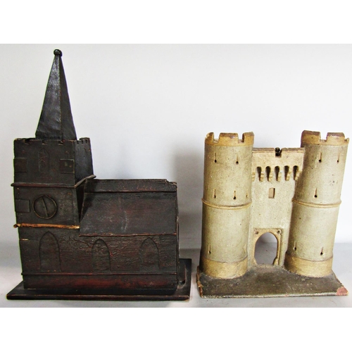 784 - A naïve wooden model of church, 27cm x 37cm high, and a flat backed model of a castle’s gateway flan... 