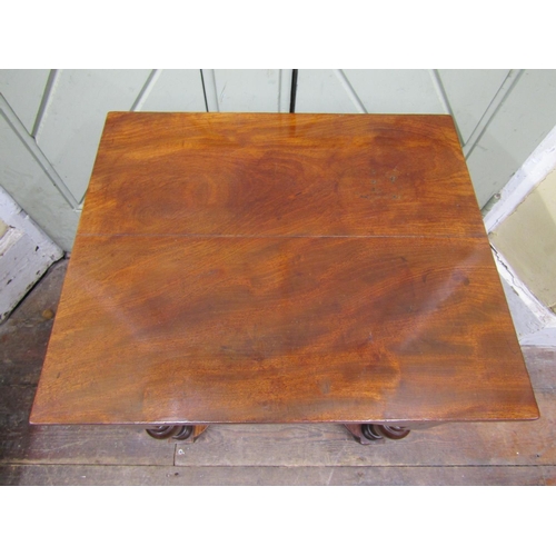 1508 - A small antique side table with rising lid in mixed woods including walnut and mahogany, raised on f... 