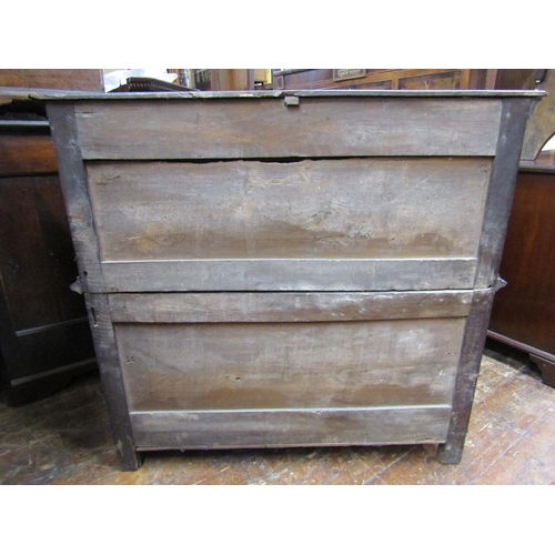 1557 - An 18th century countrymade two sectional oak chest enclosing an arrangement of four drawers of vary... 