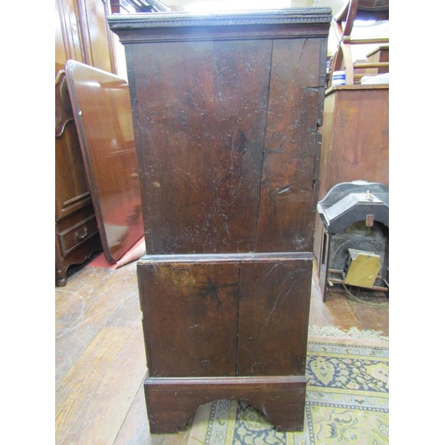 1563 - An 18th century Welsh oak linen chest with rising lid over four arched and fielded panels, the lower... 