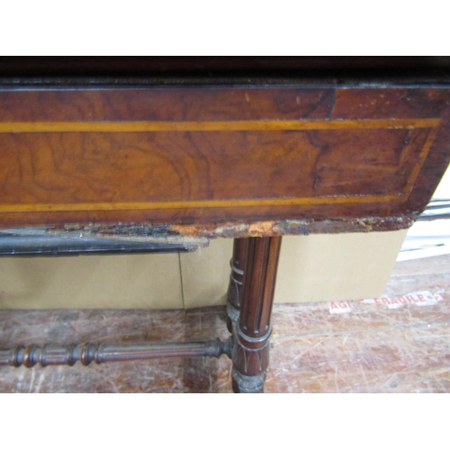 1572 - A Victorian walnut and burr walnut foldover top card table, raised on a stretcher base, supported by... 