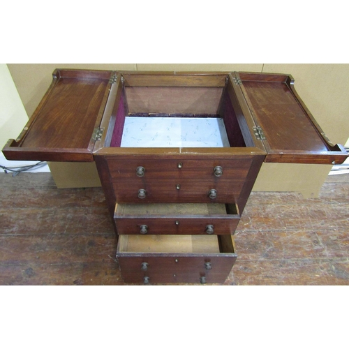 1579 - A Georgian mahogany foldover top wash stand (lacks original interior), the front elevation presented... 