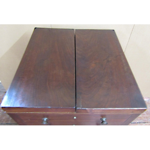 1579 - A Georgian mahogany foldover top wash stand (lacks original interior), the front elevation presented... 