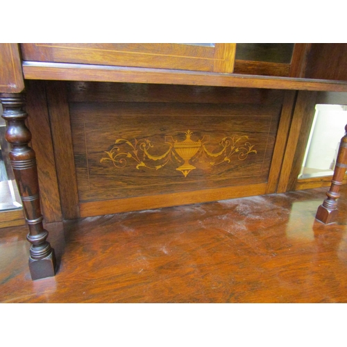 1598 - An inlaid Edwardian rosewood chiffonier, the lower section enclosed by an arrangement of cupboards a... 