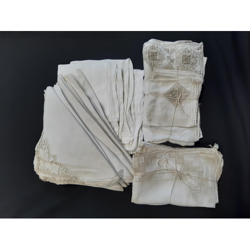 614 - 2 large bags of assorted vintage white and coloured table linen including damsak cloths, a large whi... 