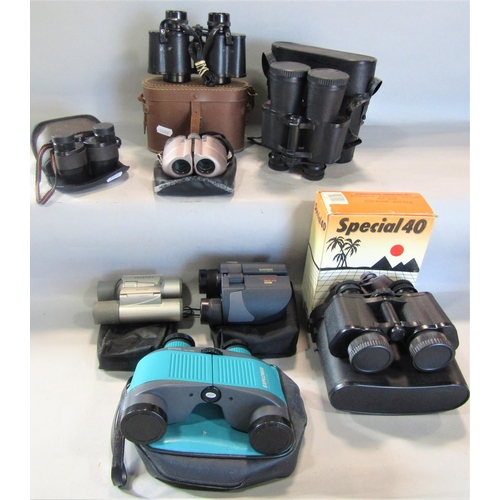 802 - A box of eight pairs of assorted binoculars.