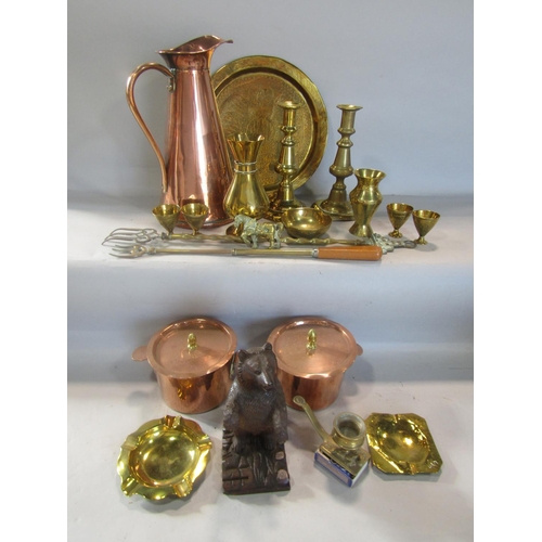 805 - A Black Forrest type bear 18cm tall, a copper jug, and a quantity of brass and copper ware , tray, c... 