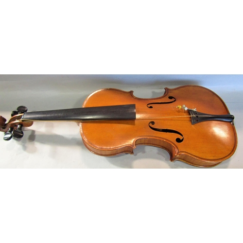 807 - A small violin, in need of restoration, bearing no interior label with a single bow and case, 55cm x... 