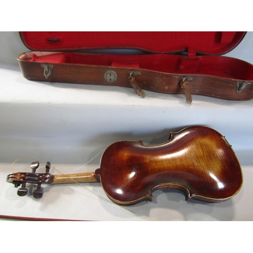 808 - A violin, in need of restoration, with a distressed unreadable label to the interior with a Tourte M... 