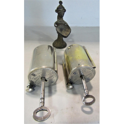 831 - Two Burns Patent Bottle Locks, both with keys and working,  and an Indian figure holding a bowl.