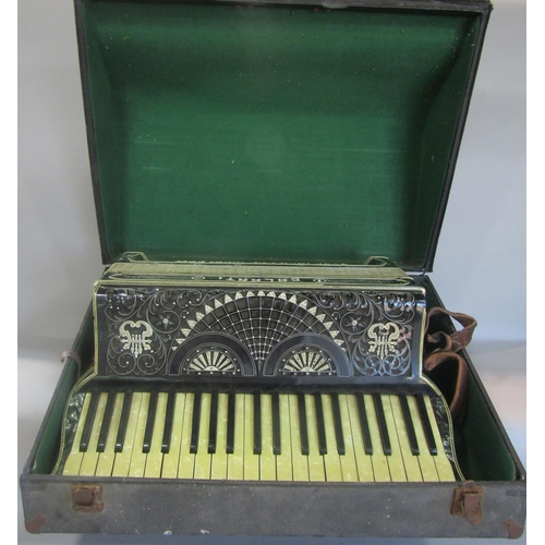 832 - A vintage  Galanti piano accordion with pearlised and diamanté body and keys, with it’s case.