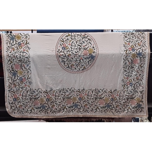 602 - Large crewelwork bedspread with chain stitched borders around a central motif 235 x255cm. Some stain... 