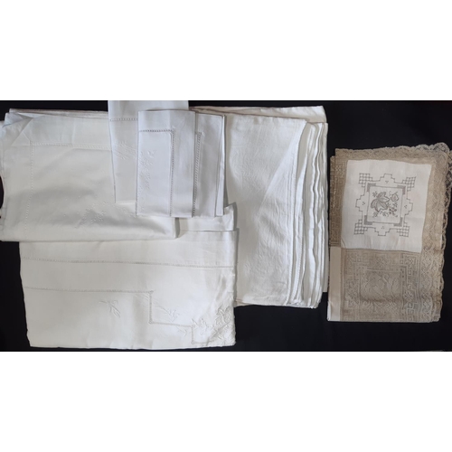 616 - Bed and table linen including a sheet (width 180cm) and 2 matching pillow cases in white cotton with... 