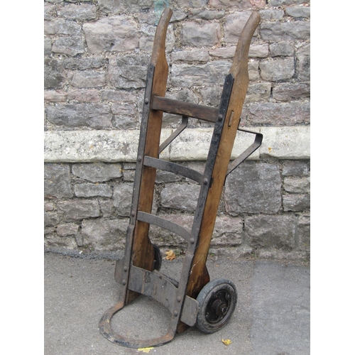 1069 - A vintage heavy gauge sack truck, with ashwood shafts, hard rubber wheels