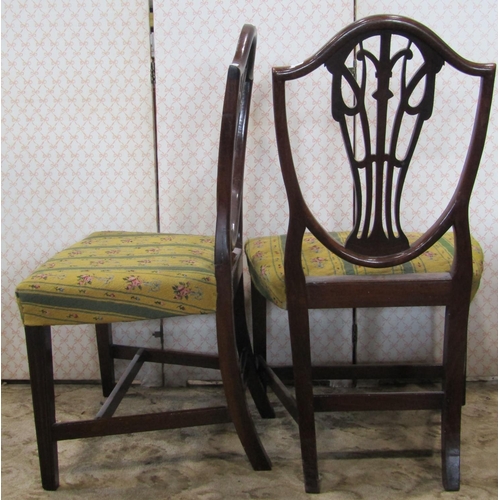 1348 - A pair of Georgian mahogany Hepplewhite style dining/side chairs, the pierced shield shaped back wit... 