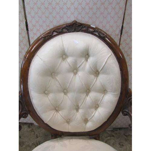 1353 - A Victorian drawing room chair with cream ground repeating leaf patterned upholstered seat with serp... 