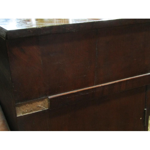 1361 - An early 19th century mahogany twin pedestal sideboard fitted with three frieze drawers to central b... 