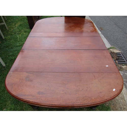 1389 - A late Victorian walnut wind-out extending dining table with rounded moulded edge, single additional... 