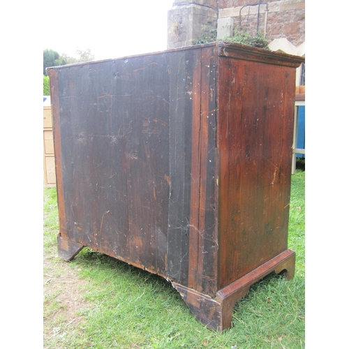 1509 - An 18th century walnut chest of three long and three short drawers with crossbanded detail, the top ... 