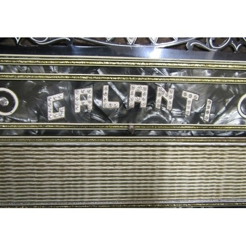 832 - A vintage  Galanti piano accordion with pearlised and diamanté body and keys, with it’s case.