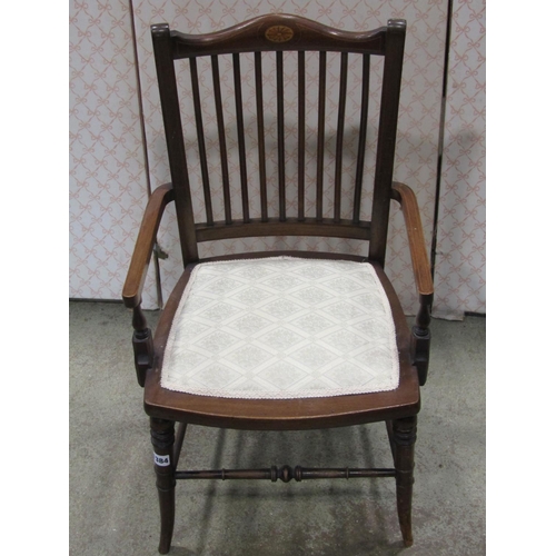 1384 - An Edwardian mahogany child's open armchair with inlaid detail, slender curved vertical rail back ov... 