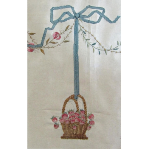 976 - Georgian silk embroidery of basket of flowers and ribbons in glazed gilt oval frame 35 x 40 cm