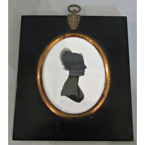 979 - Georgian silhouette portrait on plaster labeled 'T.Birkbeck', glazed in oval frame, 8 x 6.5 cm