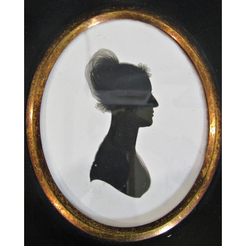 979 - Georgian silhouette portrait on plaster labeled 'T.Birkbeck', glazed in oval frame, 8 x 6.5 cm