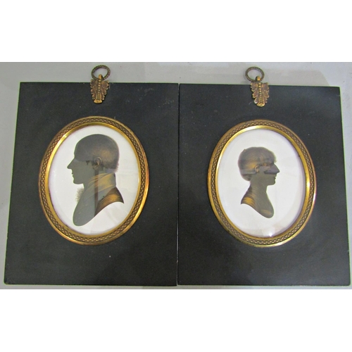 983 - Pair of silhouette couple portraits of Major and Mrs. Greene of Calcutta on plaster wit gilt highlig... 